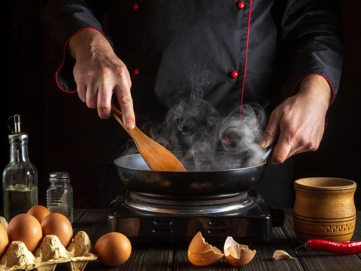 cooking eggs in pan